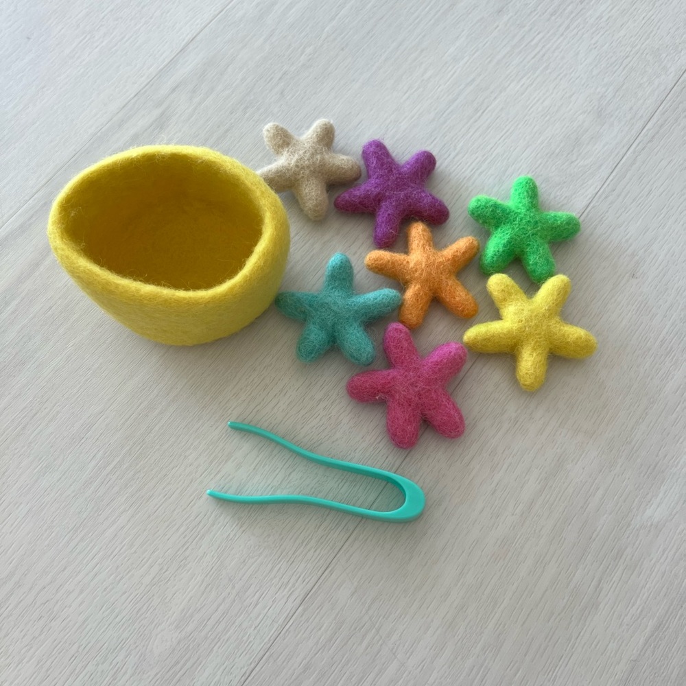 Lovevery felt stars and tweezers